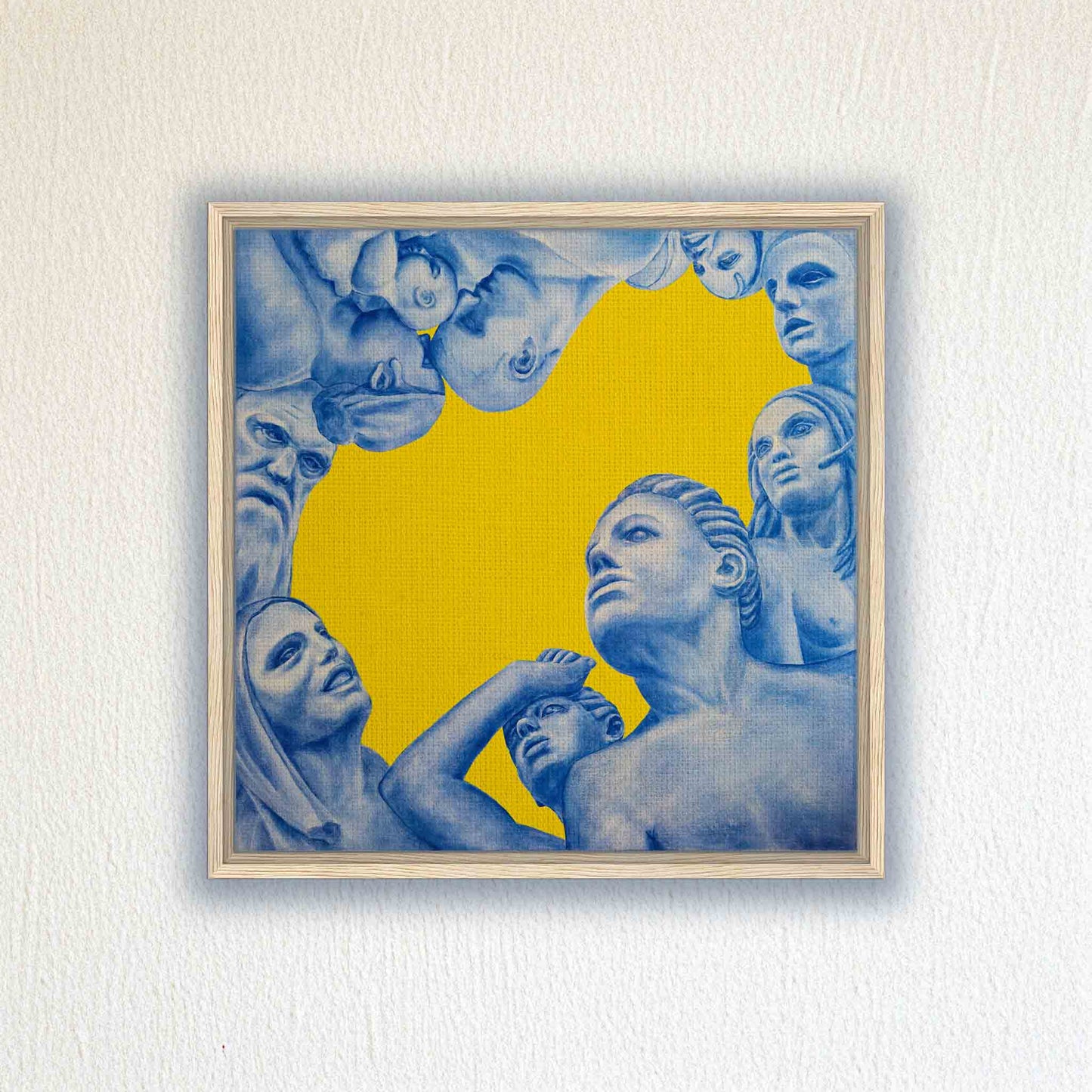 Framed artwork with blue figures on a yellow background