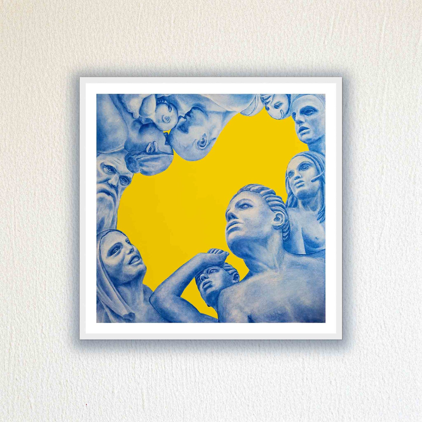 Framed artwork with classical figures against a yellow background