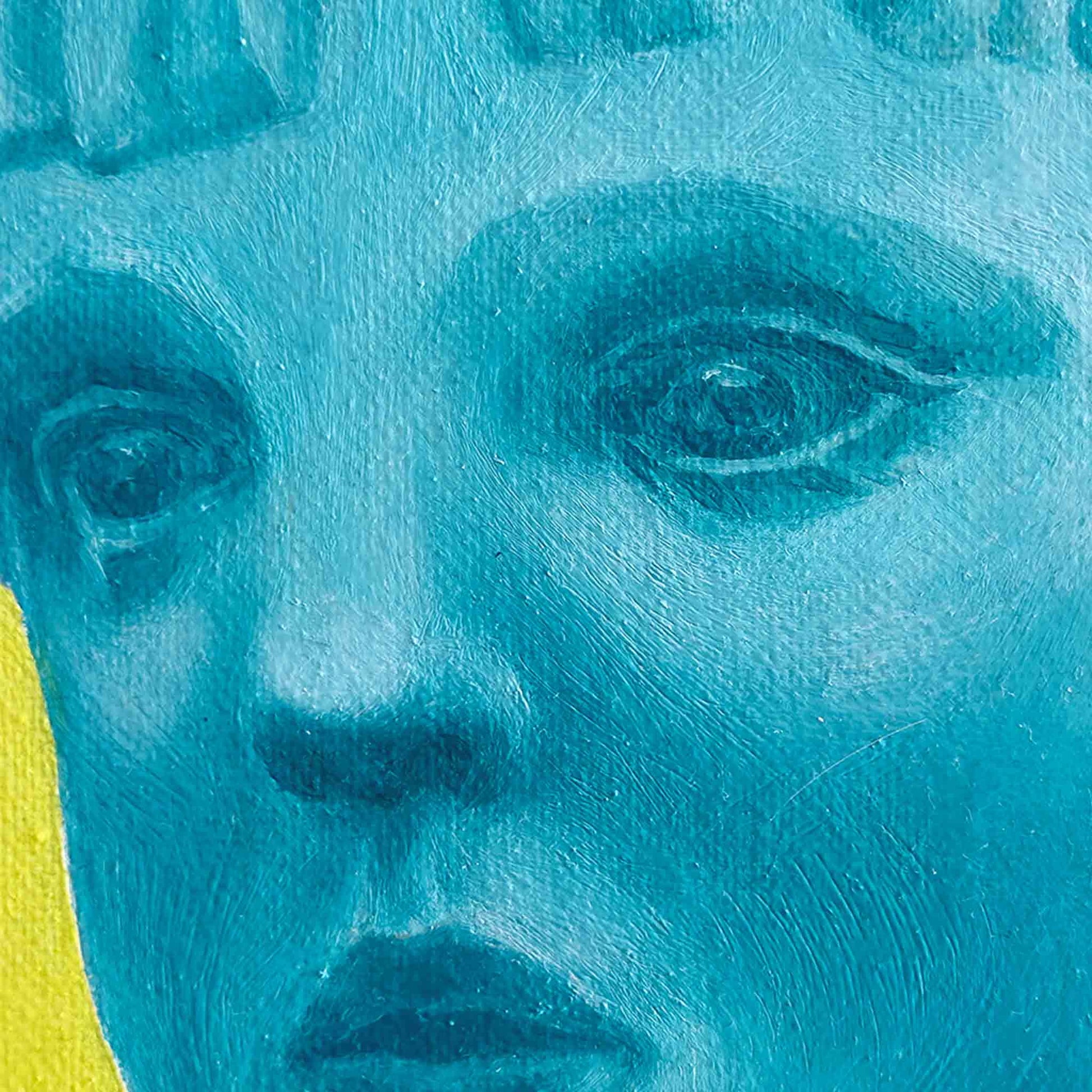 Close-up of a stylized face with blue and yellow colors