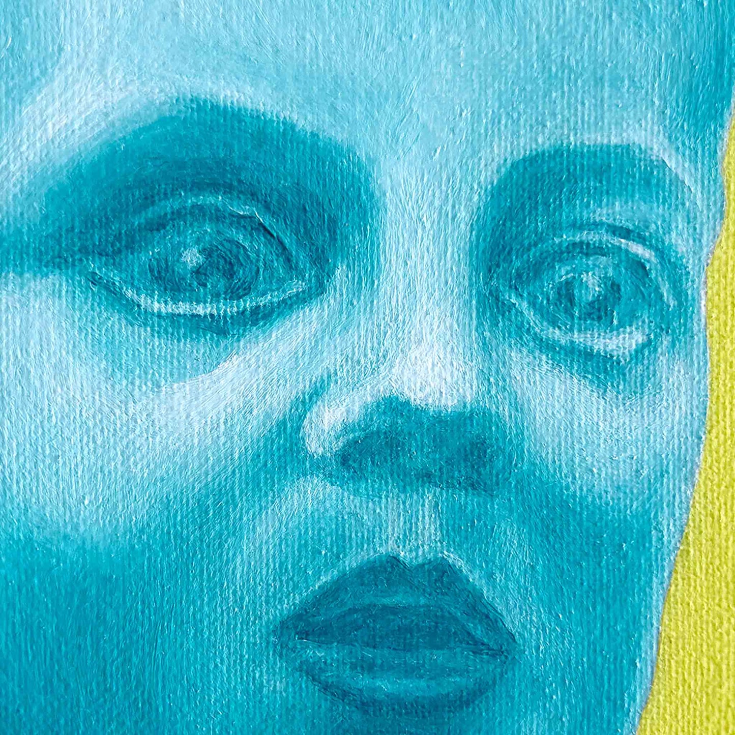 Close-up of a face with blue and yellow colors