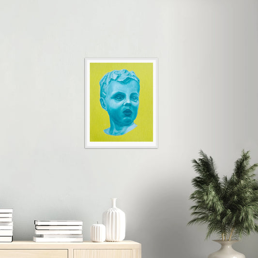 Framed artwork of a blue portrait on a green background, displayed in a room with decor elements.